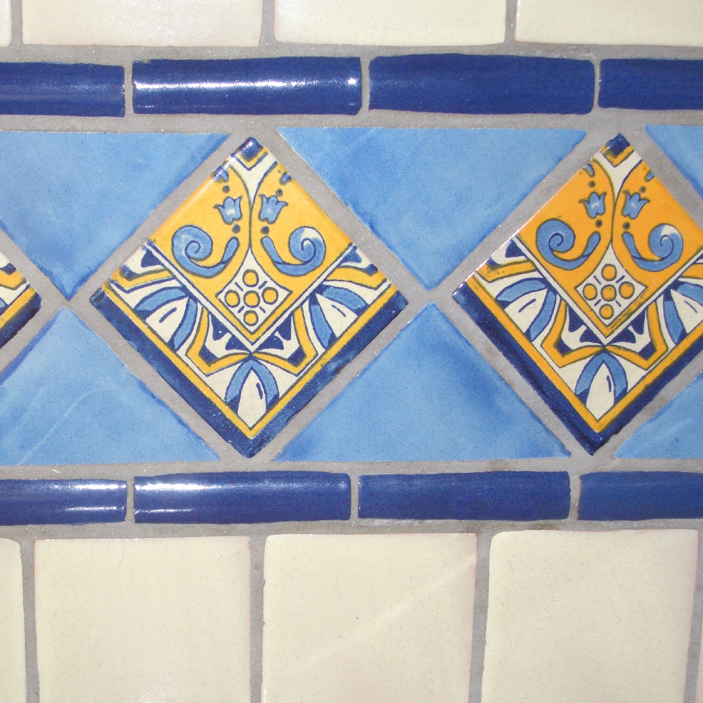 mexican ceramic tile accent in a kitchen wall