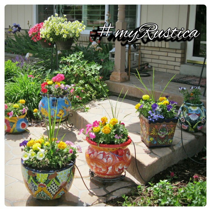 rustic garden,rustic garden, patio and veranda furniture handmade in iron as well as cast aluminum, hand painted talavera pottery from Mexico, decorative bird feeders and outdoor lighting