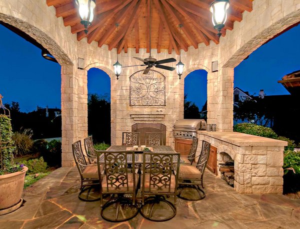 iron ceiling chandelier illuminating outdoor gazebo