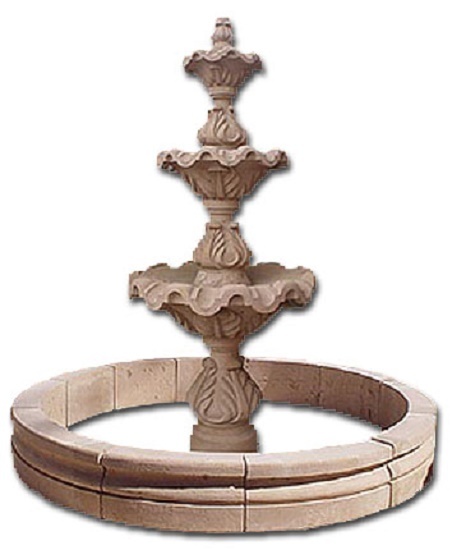 handmade cantera stone fountain from Mexico decorating a garden back yard