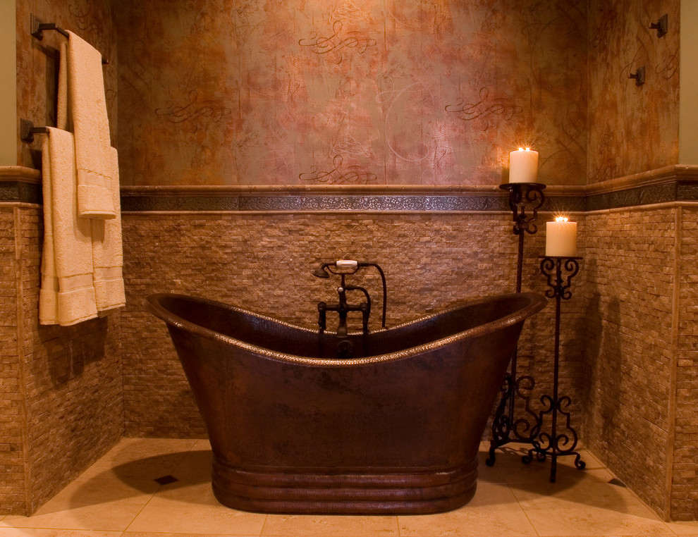 Great looking residential bathroom is furnished with a handcrafted, hammered copper bathtub Hammered Copper Bathtub