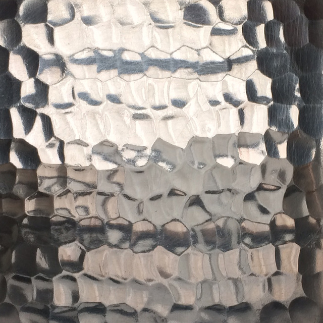 rustica pewter range hood in a kitchen